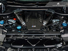 AutoTecknic Dry Carbon Strut Brace Installed in BMW X5M Engine Bay